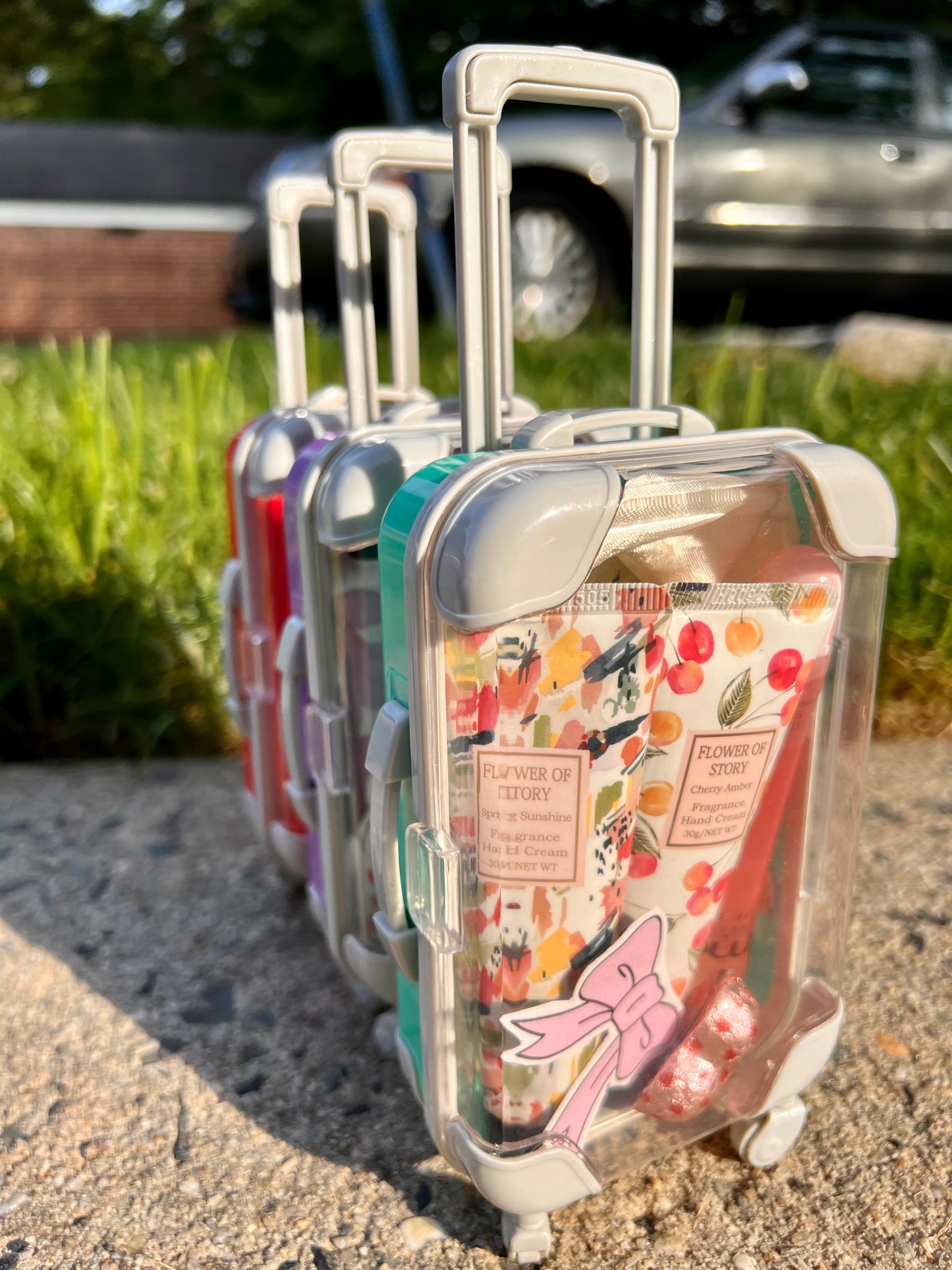 Main Suitcase Bundle
Suitcase bundle containing five random self‑care essentials and a surprise free gift
Scrunchies
Set of colorful scrunchies included in the self‑care suitcase bundle
Hand‑Cream
Nourishing hand‑cream tube from the self‑care suitcase bundle
Eye Mask
Hydrating eye mask from the self‑care suitcase bundle
Bath Salt
Relaxing bath salt jar included in the self‑care suitcase bundle
Lip Gloss
Shimmer lip gloss from the self‑care suitcase bundle
Lip Balm
Moisturizing lip balm included in the