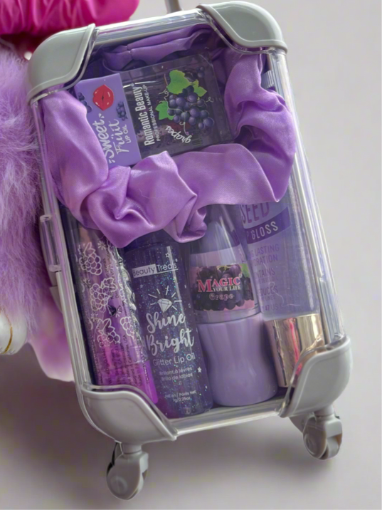 Colorful mini suitcase lipgloss bundle with glitter glosses, grape lip oil, and fluffy bunny keychain – perfect kawaii gift for teens and lip gloss lovers