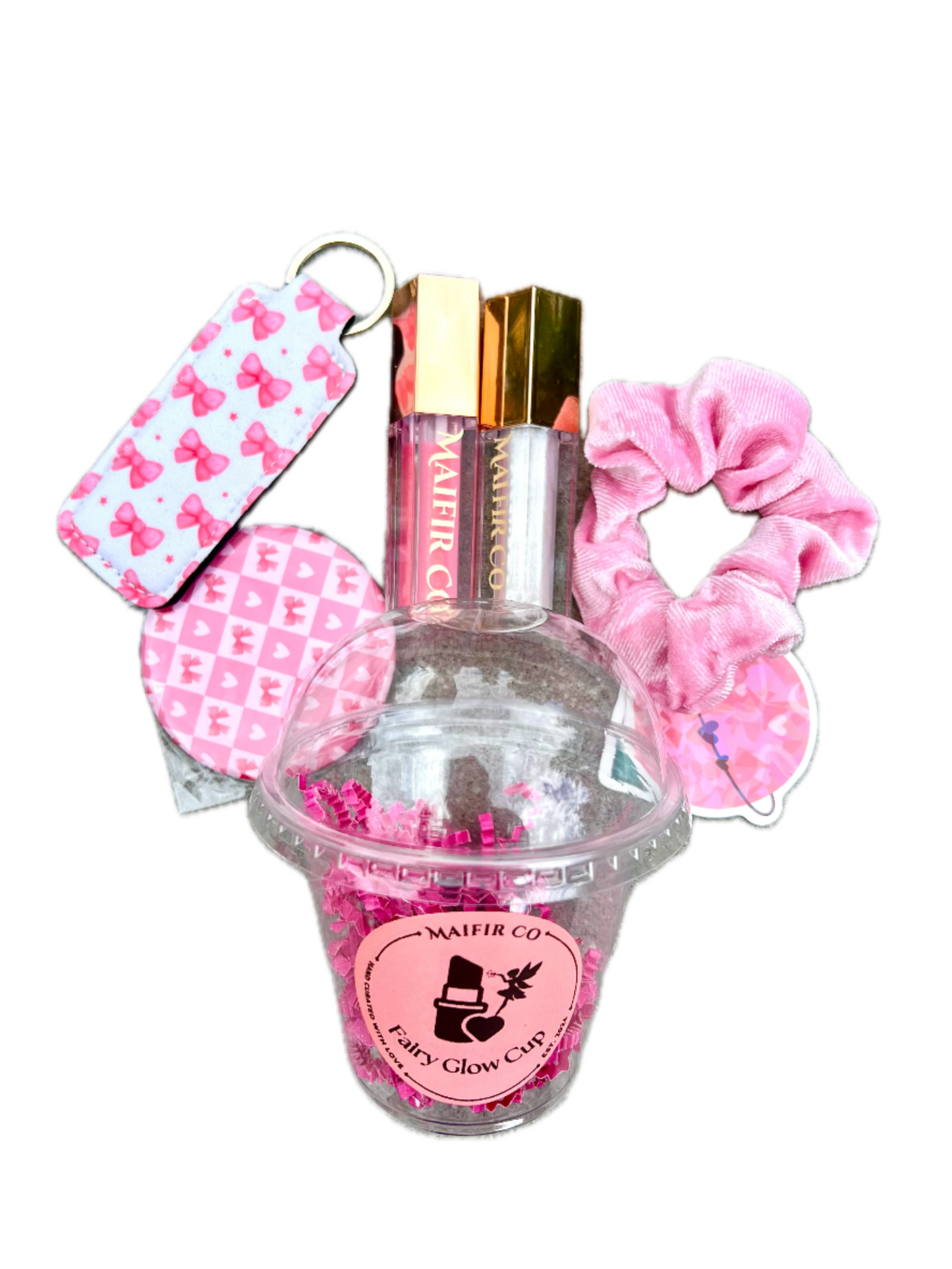 Lipglosses, a mirror, a lipgloss holder, a scrunchie, and freebie stickers.