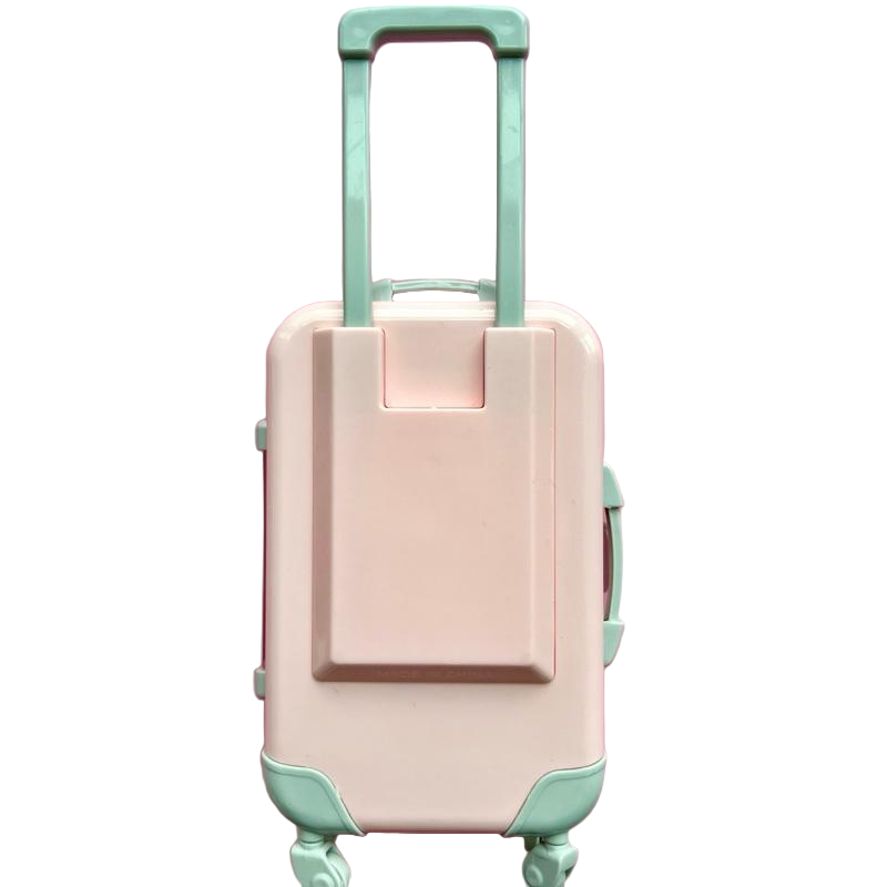 Pink suitcase with green accents on a white background